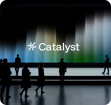 Silhouettes against a Catalyst stage backdrop